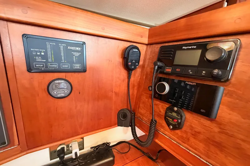 Slide: The Image of Control panel of a 2002 Tartan 3700 sailboat with navigation and communication equipment. - 51