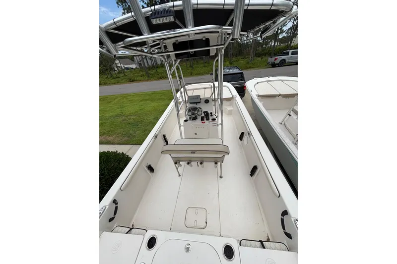 Slide: The Image of 2020 Carolina Skiff 21 LS boat interior with T-top and seating. - 6