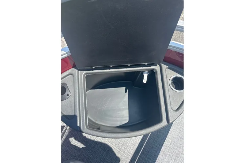 Slide: The Image of Open storage compartment on 2026 Sun Tracker Sportfish 24 XP3 boat. - 6