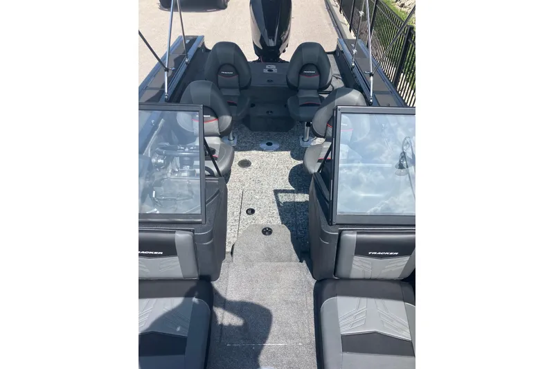 Slide: The Image of 2026 Tracker Targa V-19 Combo boat interior with seating and windshield, showcasing spacious design. - 5