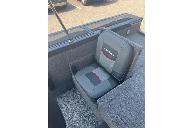 Slide: The Image of 2026 Tracker Targa V-19 Combo boat seat with gray and red design. - 9