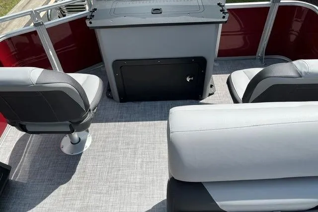 Slide: The Image of Interior of 2026 Sun Tracker SportFish 22 XP3 pontoon boat with seating and helm. - 14