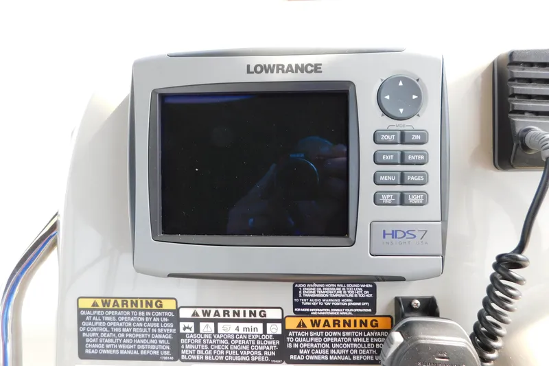 Slide: The Image of Lowrance HDS7 marine GPS system on 2009 Bayliner 300 boat dashboard. - 36