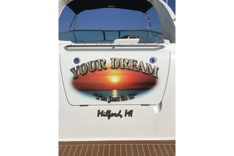 Slide: The Image of 2009 Bayliner 300 boat with "Your Dream" sunset graphic, Milford, MI. - 9
