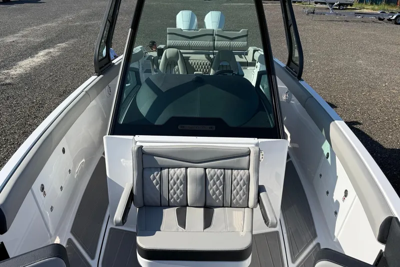 Slide: The Image of 2027 Monterey Elite 30 OB boat interior with luxurious seating and modern design. - 5