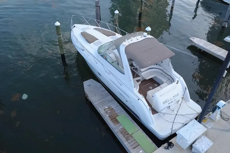 Slide: The Image of 2003 Formula 37 Performance Cruiser docked at marina, aerial view. - 4