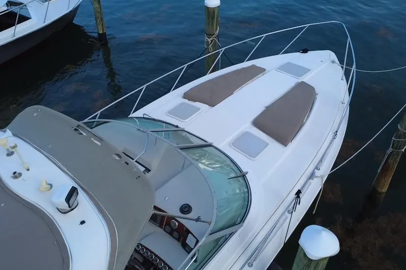 Slide: The Image of 2003 Formula 37 Performance Cruiser docked, aerial view of deck and seating area. - 10