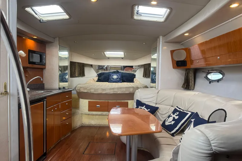Slide: The Image of Luxurious interior of a 2003 Formula 37 Performance Cruiser with elegant seating and modern amenities. - 40