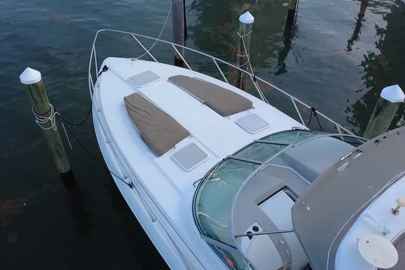 Slide: The Image of 2003 Formula 37 Performance Cruiser docked, aerial view of deck and seating area. - 9