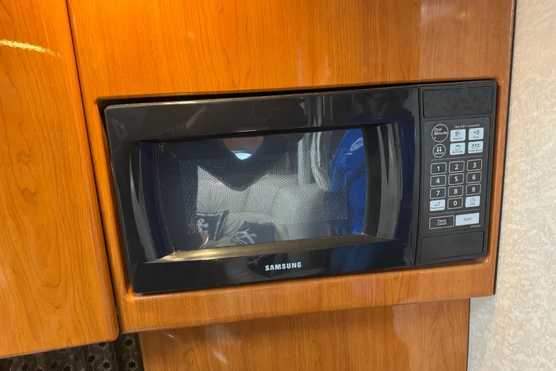 Slide: The Image of Built-in Samsung microwave in 2003 Formula 37 Performance Cruiser kitchen. - 60
