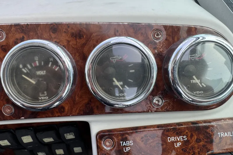 Slide: The Image of Dashboard gauges of a 2003 Formula 37 Performance Cruiser boat. - 36