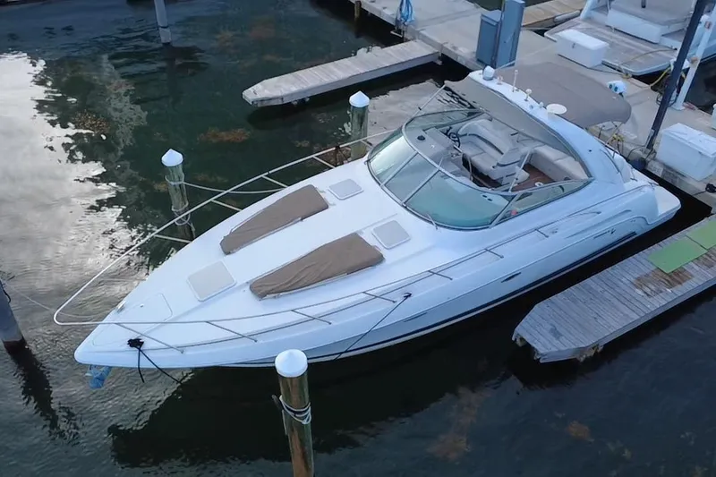 Slide: The Image of 2003 Formula 37 Performance Cruiser docked at marina, aerial view. - 6