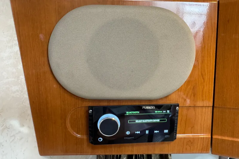 Slide: The Image of Audio system with Bluetooth on 2003 Formula 37 Performance Cruiser, featuring Fusion stereo and speaker. - 61