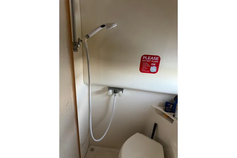 Slide: The Image of Bathroom of 2003 Formula 37 Performance Cruiser with shower and toilet. - 53