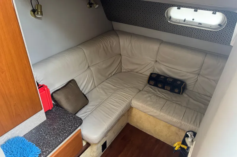 Slide: The Image of Interior of 2003 Formula 37 Performance Cruiser with cozy leather seating and decorative pillows. - 54