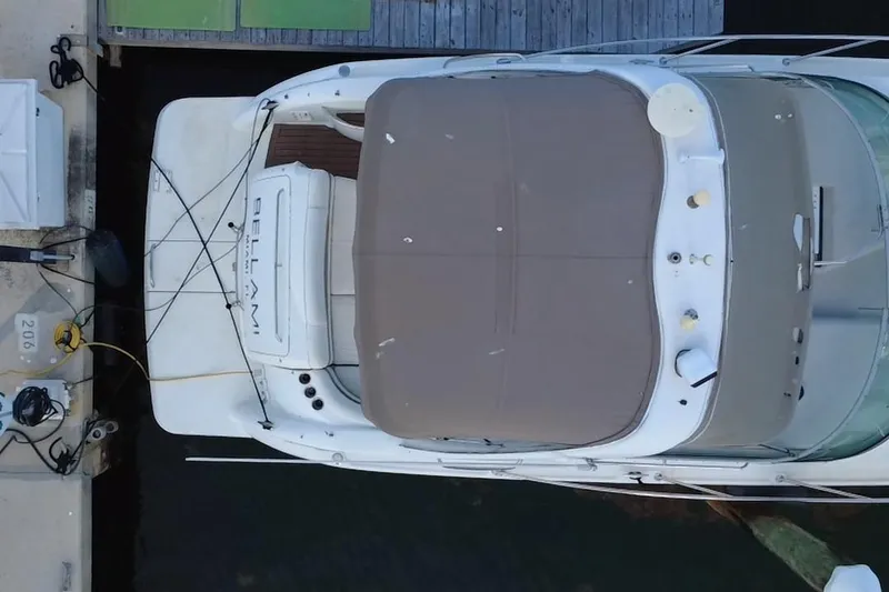 Slide: The Image of Top view of a 2003 Formula 37 Performance Cruiser docked at a marina. - 12