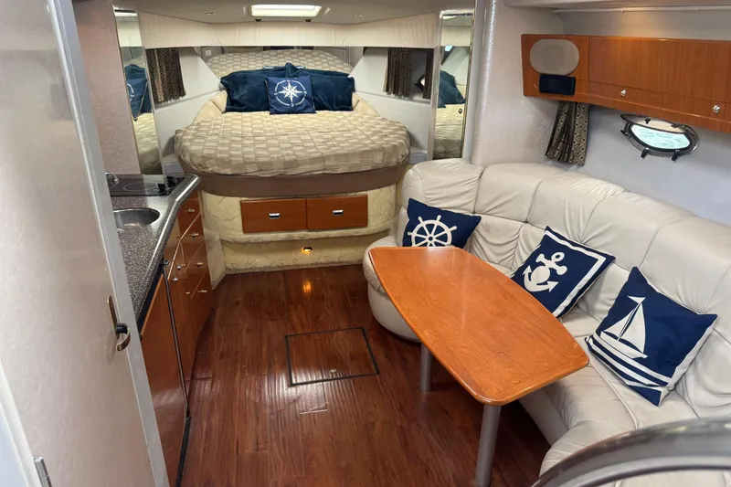 Slide: The Image of Interior of 2003 Formula 37 Performance Cruiser with cozy seating and nautical decor. - 41