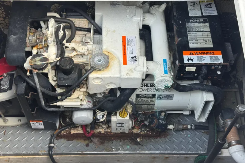 Slide: The Image of Engine compartment of a 2003 Formula 37 Performance Cruiser with Kohler power systems. - 58