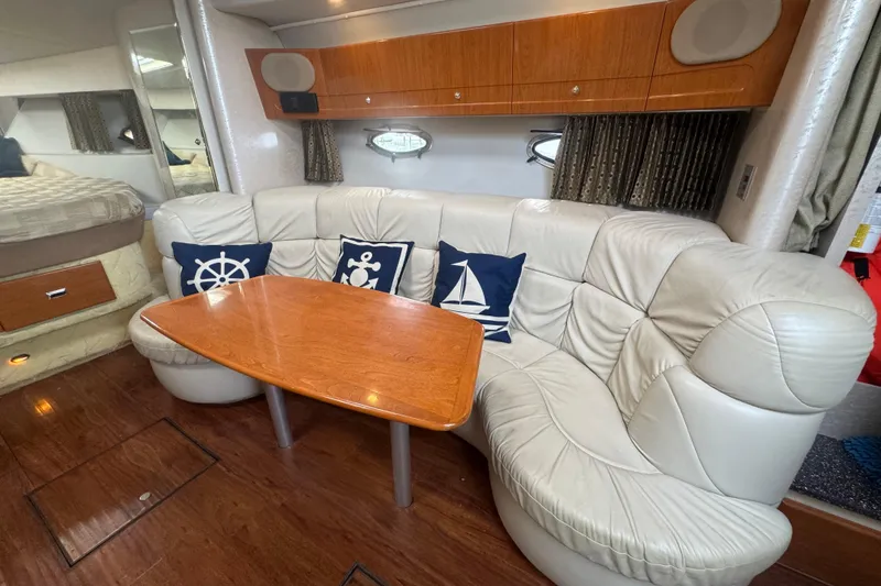 Slide: The Image of Interior of 2003 Formula 37 Performance Cruiser with leather seating and nautical-themed pillows. - 42