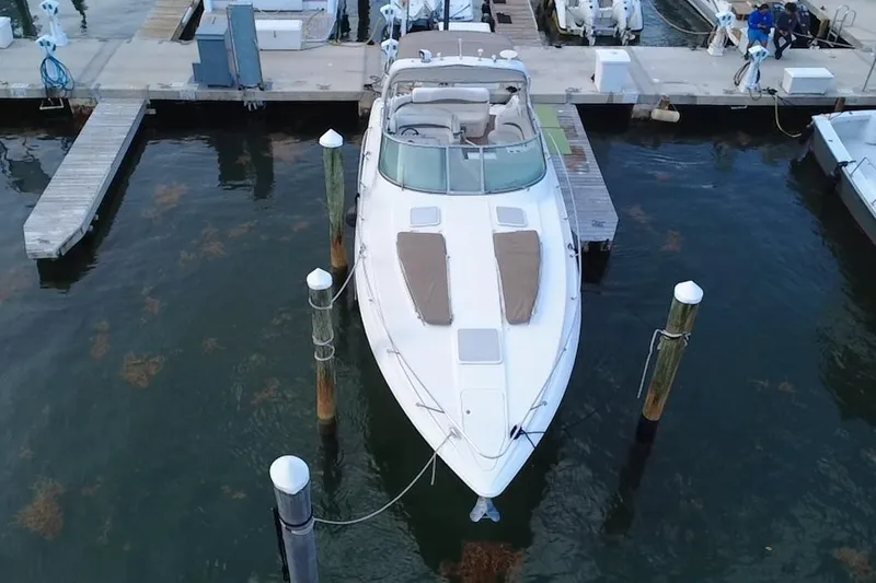 Slide: The Image of 2003 Formula 37 Performance Cruiser docked at marina, aerial view. - 7