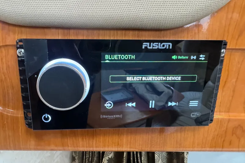 Slide: The Image of Fusion Bluetooth stereo system in a 2003 Formula 37 Performance Cruiser. - 62