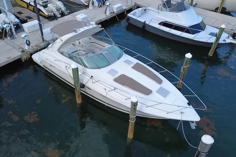 The Image of 2003 Formula 37 Performance Cruiser docked at marina, aerial view. - 0
