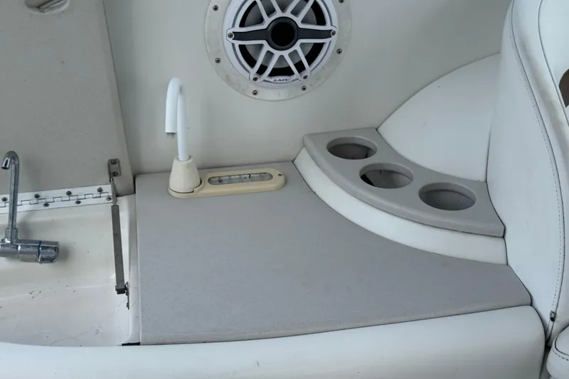Slide: The Image of Interior of 2003 Formula 37 Performance Cruiser with speaker, faucet, and cup holders. - 22