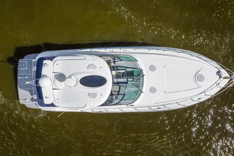 Slide: The Image of Aerial view of 2005 Cruisers Yachts 520 Express on water. - 51