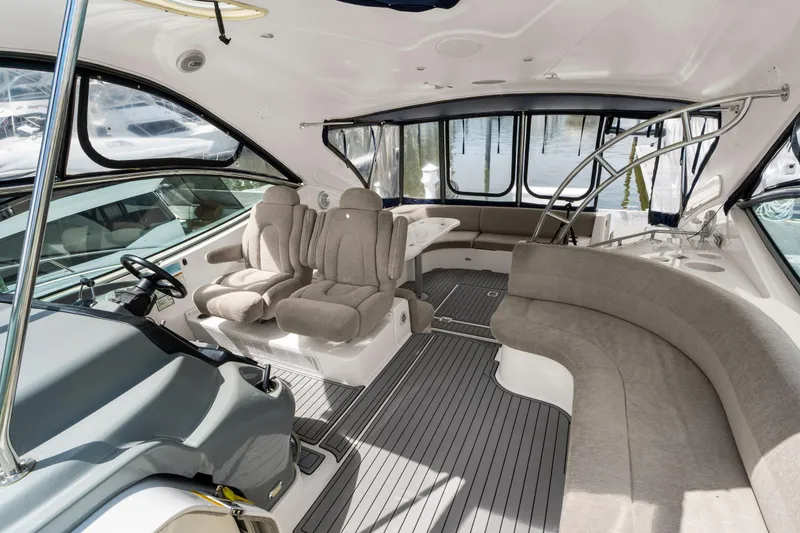 Slide: The Image of Luxurious interior of 2005 Cruisers Yachts 520 Express with plush seating and sleek design. - 37
