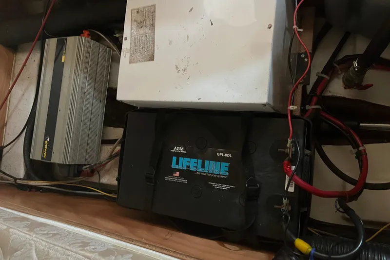 Slide: The Image of Battery and electrical components inside a 2006 Beneteau Oceanis Clipper 373 sailboat. - 39