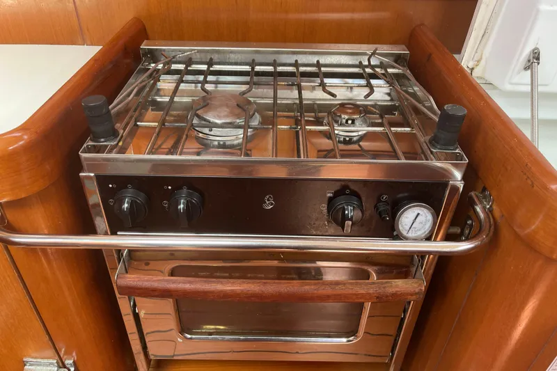 Slide: The Image of Stainless steel stove and oven in 2006 Beneteau Oceanis Clipper 373 yacht galley. - 31