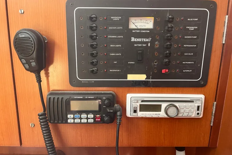 Slide: The Image of Control panel of a 2006 Beneteau Oceanis Clipper 373 sailboat with radio and switches. - 27