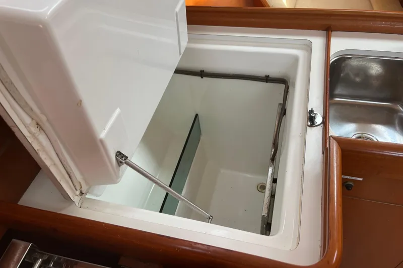 Slide: The Image of Open refrigerator in 2006 Beneteau Oceanis Clipper 373 yacht kitchen. - 33