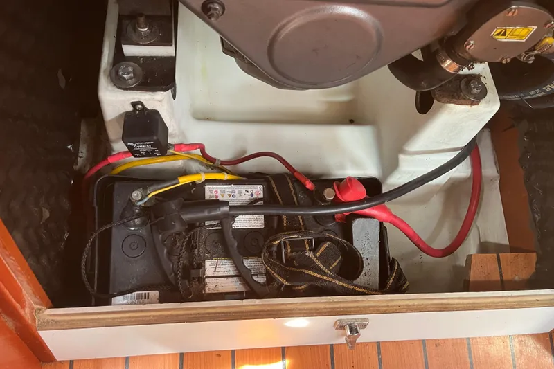 Slide: The Image of Battery compartment of a 2006 Beneteau Oceanis Clipper 373 sailboat, showing wiring and connections. - 38