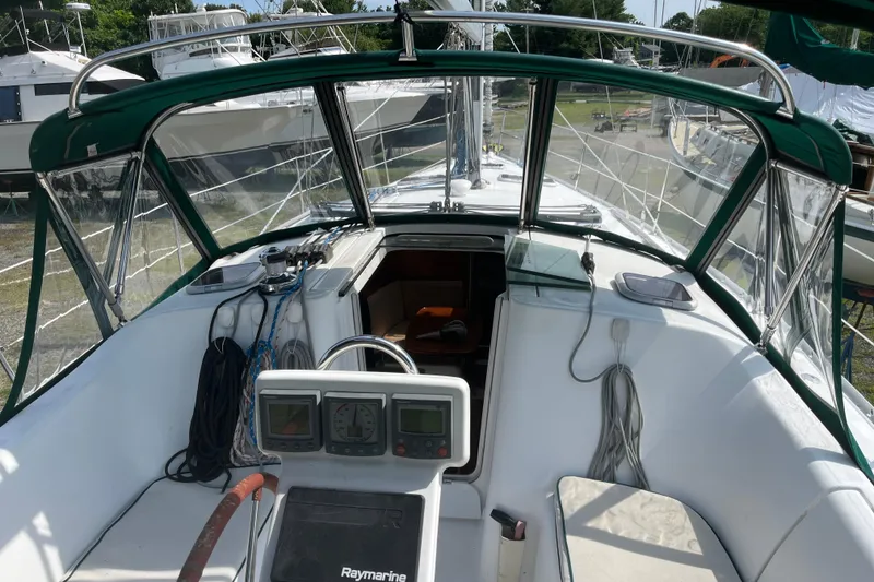 Slide: The Image of Cockpit view of 2006 Beneteau Oceanis Clipper 373 sailboat with navigation equipment. - 2