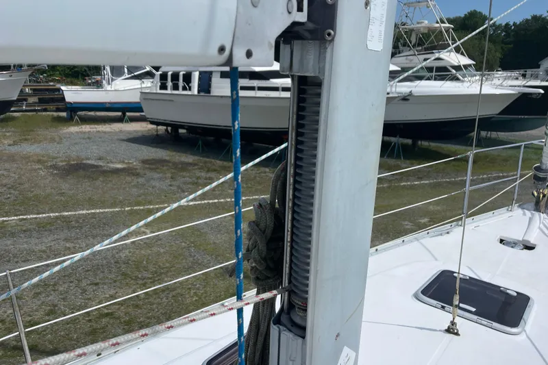 Slide: The Image of 2006 Beneteau Oceanis Clipper 373 sailboat mast and rigging in a boatyard. - 8