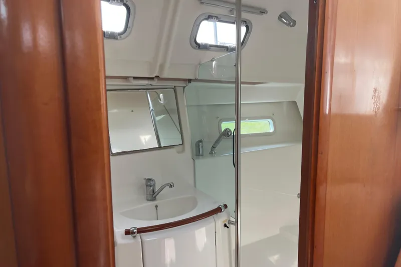 Slide: The Image of Interior of 2006 Beneteau Oceanis Clipper 373 yacht bathroom with sink and shower. - 17