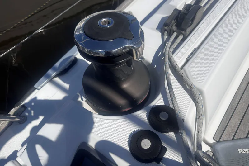 Slide: The Image of Winch and ropes on 2014 Jeanneau Sun Odyssey 509 sailboat deck. - 9