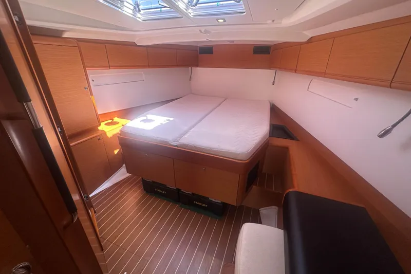 Slide: The Image of Luxurious cabin interior of 2014 Jeanneau Sun Odyssey 509 yacht with wooden finishes. - 32
