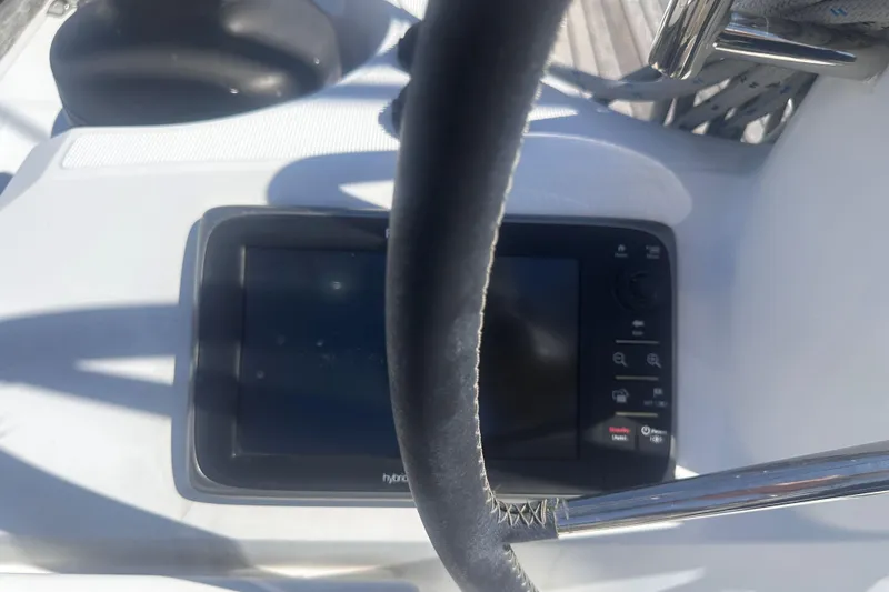 Slide: The Image of Steering wheel and navigation system on a 2014 Jeanneau Sun Odyssey 509 yacht. - 7