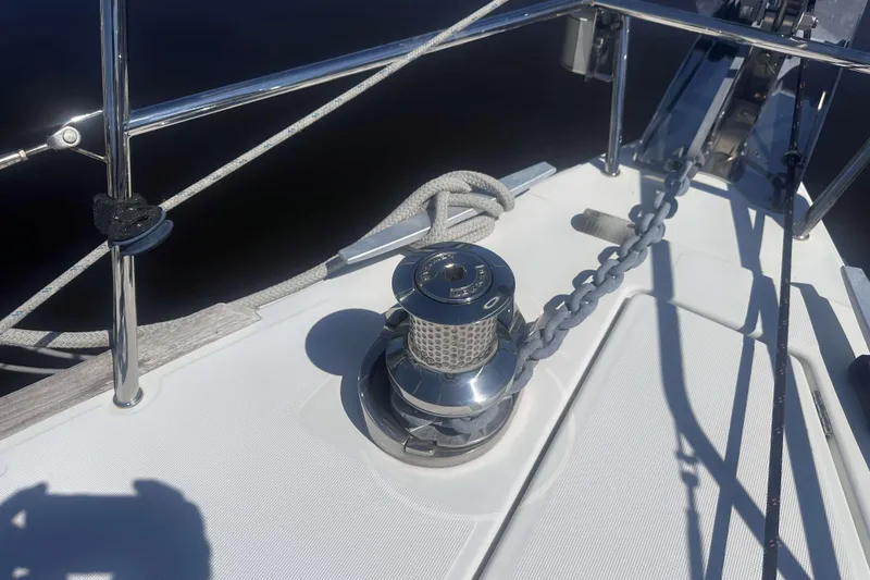 Slide: The Image of Deck of 2014 Jeanneau Sun Odyssey 509 sailboat with anchor chain and winch. - 13
