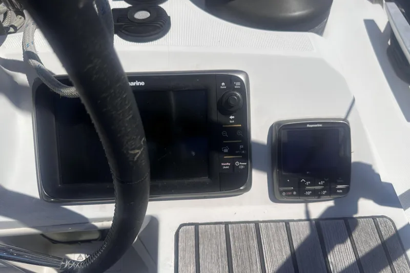 Slide: The Image of Steering console of 2014 Jeanneau Sun Odyssey 509 with Raymarine navigation equipment. - 8