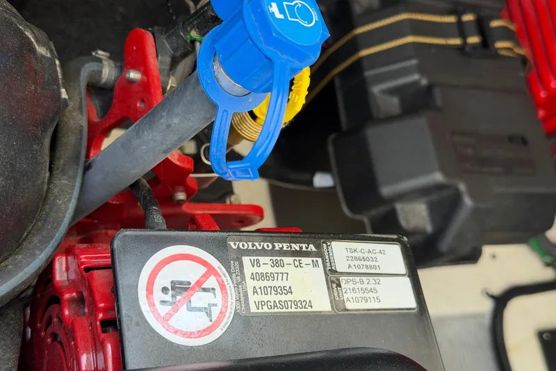 Slide: The Image of Close-up of a Volvo Penta engine component in a 2020 Regal 38 Grande Coupe. - 42