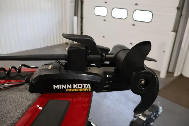 Slide: The Image of Minn Kota PowerDrive motor on 2024 Tracker Targa V-18 Combo boat, indoors. - 21