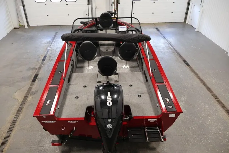 Slide: The Image of 2024 Tracker Targa V-18 Combo boat, red exterior, spacious interior, powerful 150 engine. - 45