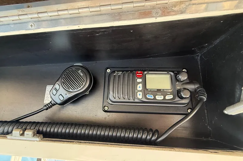 Slide: The Image of VHF marine radio and microphone on 1989 Viking 35 Convertible boat. - 19