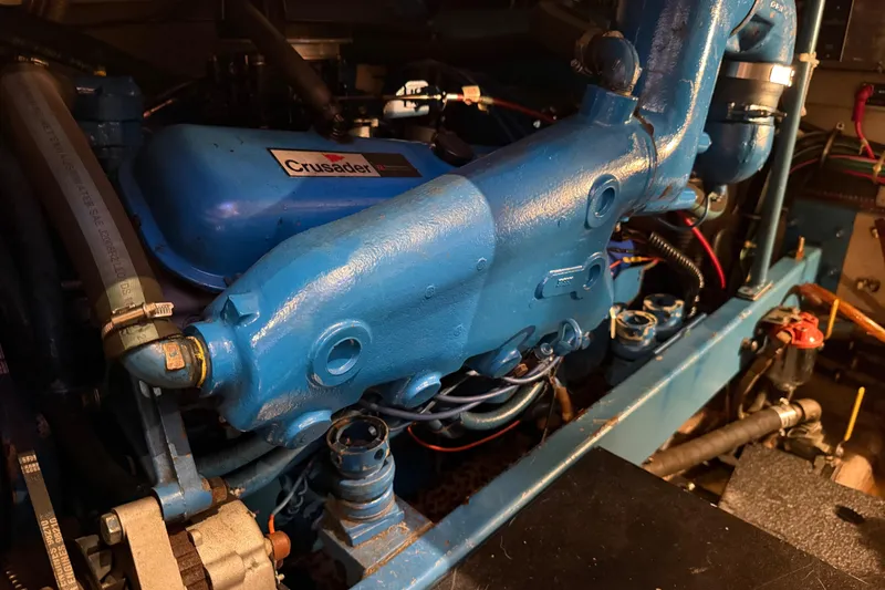 Slide: The Image of Engine compartment of a 1989 Viking 35 Convertible boat with Crusader engine. - 37