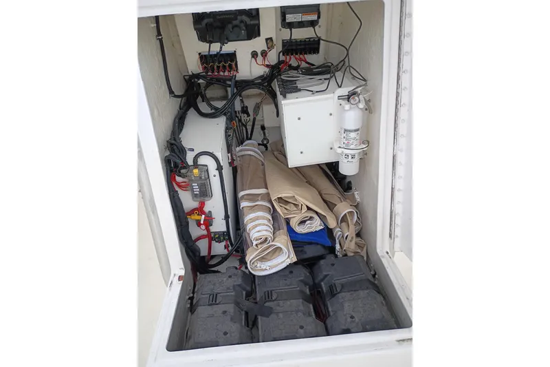 Slide: The Image of Electrical compartment of a 2002 Paramount Supper Fish boat with wiring and equipment. - 5