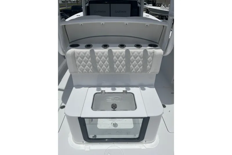 Slide: The Image of 2026 Sea Hunt Ultra 285 Coffin Box interior with seating and storage compartments. - 13