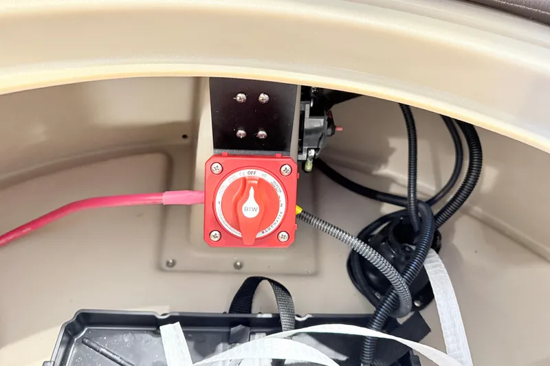 Slide: The Image of Battery switch and wiring inside a 2026 Bentley Pontoons LE 160 CR boat. - 9